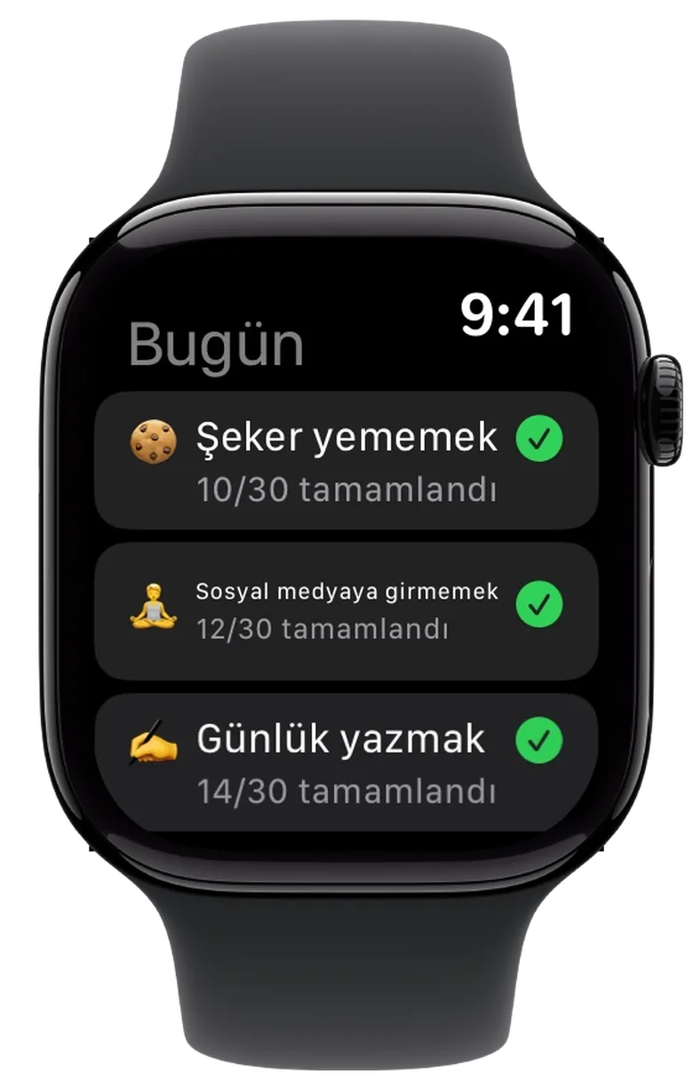 Apple Watch’ta alt alta üç challenge, her biri yeşil onay işareti ve tamamlanan günlerle